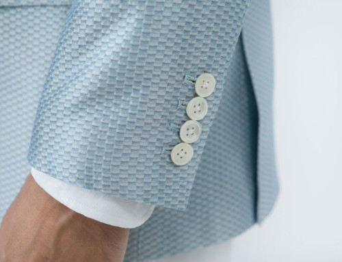 Sleeve buttons on a silk–piqué jacket